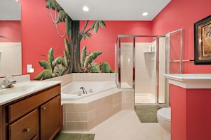 Shower, jetted tub, towels