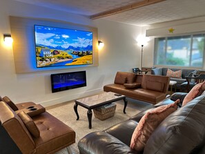 Smart TV, fireplace, ping pong, music library