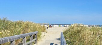 Family vacation home directly at the spa gardens in Norddeich - fenced garden