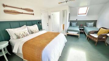 Habitación Deluxe con 1 cama doble o 2 individuales, vistas al jardín | Minibar, caja fuerte, decoración individual