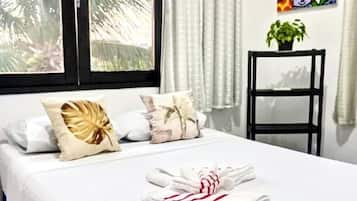 Habitación familiar doble, vistas al jardín | Wifi gratis