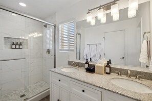 Shower, hair dryer, towels, soap