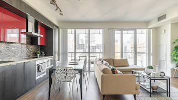 Design Apartment | Living area | 40-inch Smart TV with cable channels