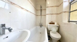Hair dryer, towels, soap, toilet paper