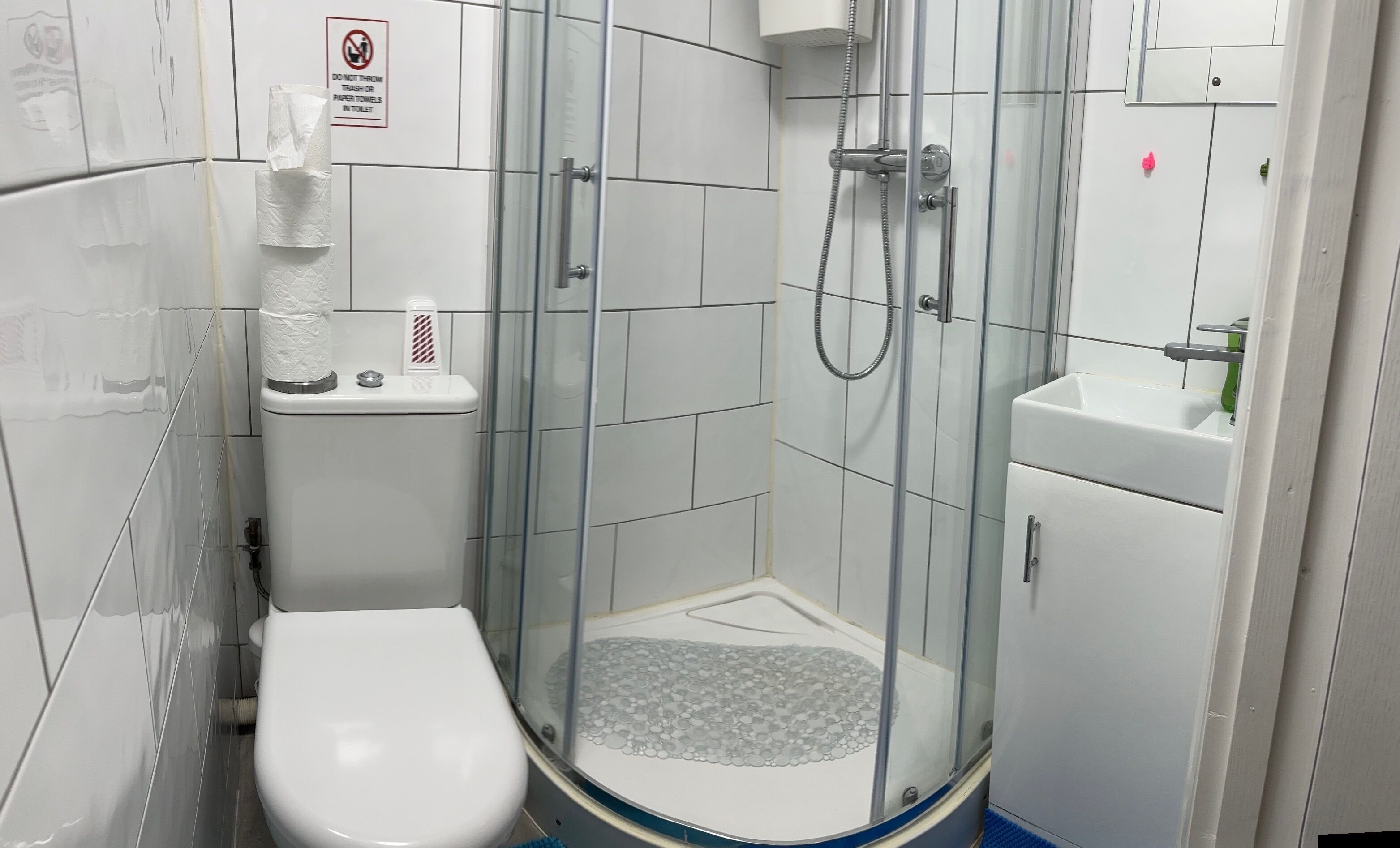 Shower, towels, soap, toilet paper