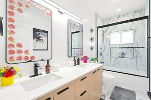 Shower, hair dryer, towels, soap