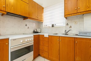 Apartment, Balcony, Mountain View | Iron/ironing board, free WiFi