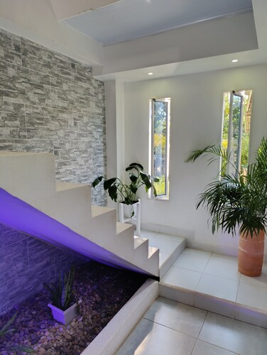 Spacious 2-bedroom cottage in tranquil Doradal Antioquia with AC, WiFi