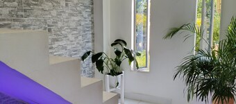 Spacious 2-bedroom cottage in tranquil Doradal Antioquia with AC, WiFi