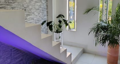 Spacious 2-bedroom cottage in tranquil Doradal Antioquia with AC, WiFi