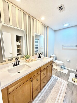 Hair dryer, towels, soap, shampoo