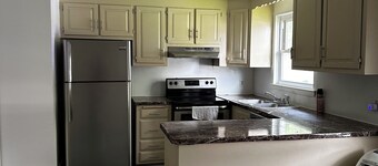 Charming 3- bedroom townhome in New Britain with AC, WiFi