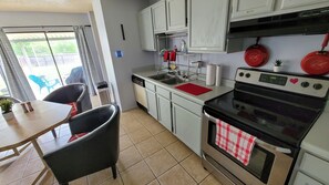 Fridge, microwave, oven, stovetop - Game On!! Pet friendly private home w/ Pool Table, Arcade & Yard. (San Antonio)