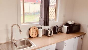 Fridge, microwave, coffee/tea maker, electric kettle