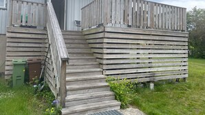 A wooden building with a ramp leading to a door marked with the number 2. - 4 Star Holiday Home in Karlskrona (Hasslö)