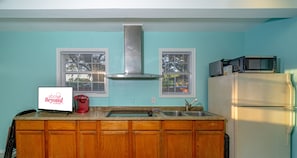 Fridge, microwave, stovetop, coffee/tea maker