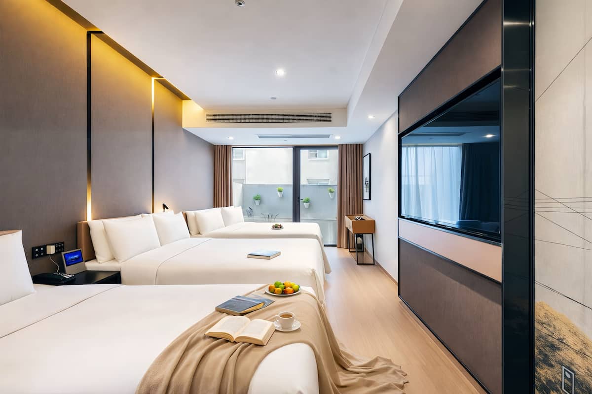 Family Triple Room | Premium bedding, down comforters, memory foam beds, free minibar