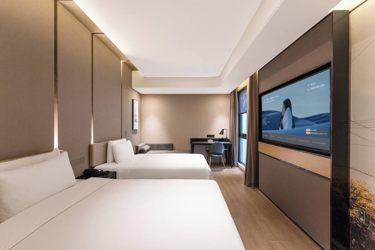 Premium bedding, down duvets, memory-foam beds, free minibar