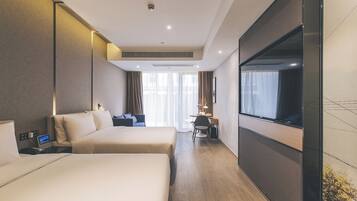 Family Room, Balcony, City View | Premium bedding, down comforters, free minibar, soundproofing