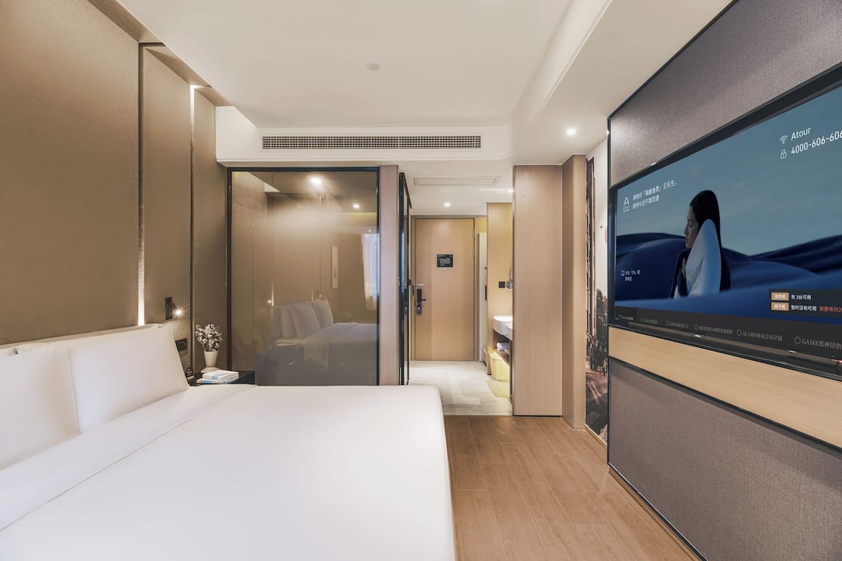 Premium bedding, down comforters, memory foam beds, free minibar