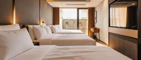 Family Triple Room | Premium bedding, down comforters, memory foam beds, free minibar
