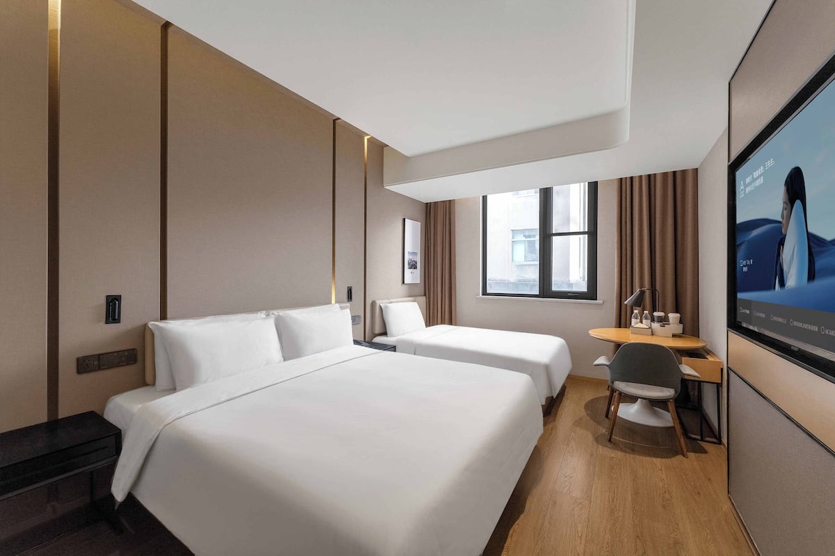 Executive Twin Room, City View | Premium bedding, down comforters, memory foam beds, free minibar