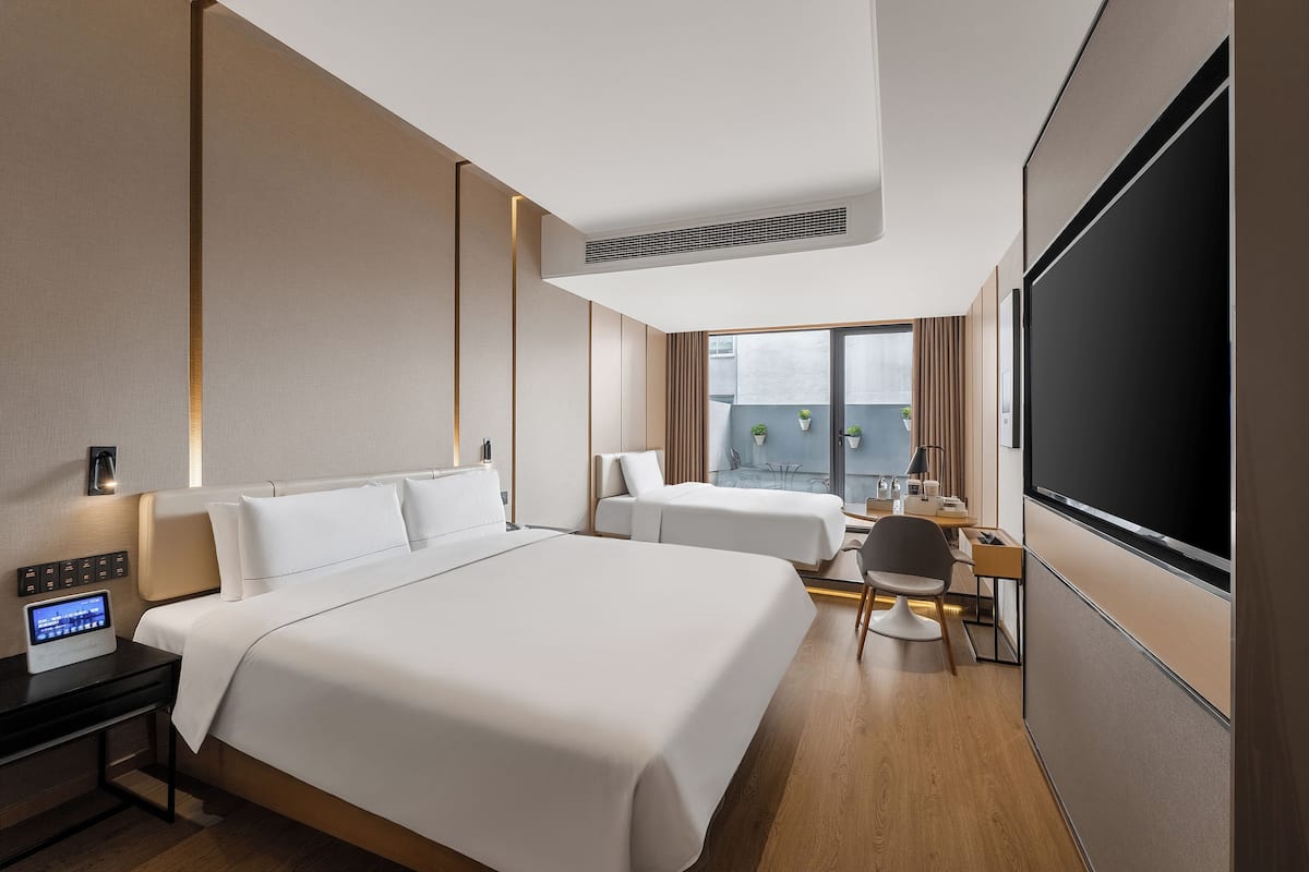 Premium bedding, down comforters, memory foam beds, free minibar