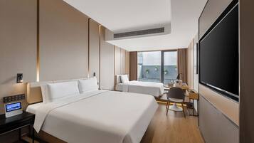 Premium bedding, down duvets, free minibar, soundproofing