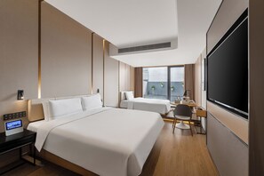 Premium bedding, down duvets, free minibar, soundproofing