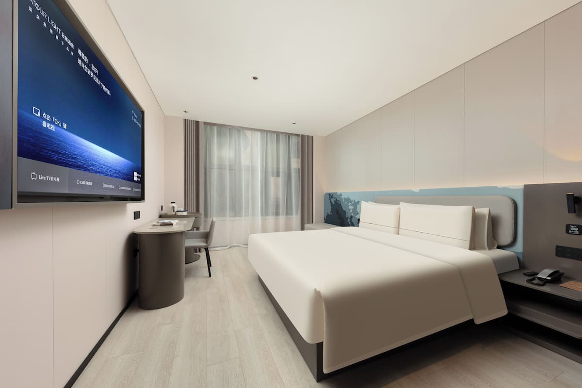 Premium bedding, down duvets, memory-foam beds, free minibar
