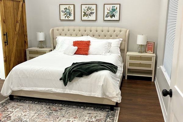 Tempur-Pedic California King bed and attached spa-like bathroom