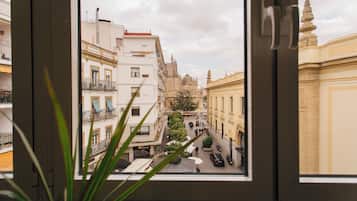 Apartment, City View | Living area | Flat-screen TV