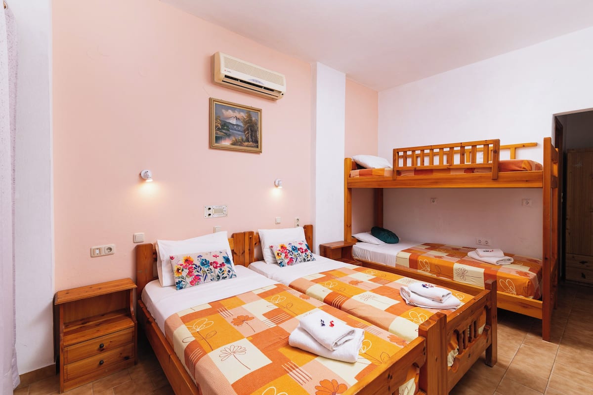 Quadruple Room, Balcony, Courtyard View | In-room safe, free WiFi