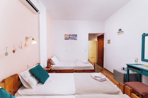 Triple Room, Balcony, Courtyard View | In-room safe, free WiFi
