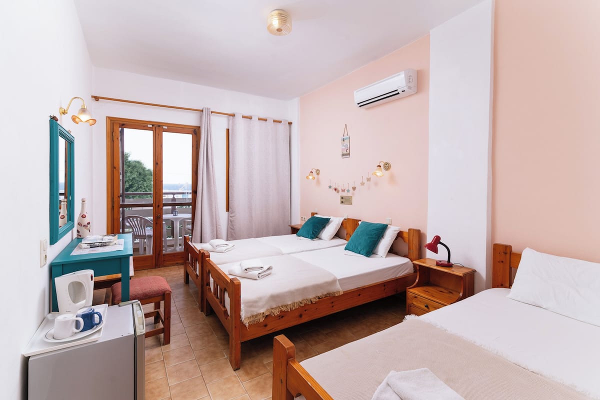 Triple Room, Balcony, Courtyard View | In-room safe, free WiFi