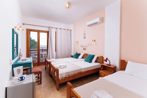 Triple Room, Balcony, Courtyard View | In-room safe, free WiFi