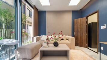 Deluxe House, Multiple Bedrooms, Balcony, City View | Living area | 32-inch Smart TV with cable channels