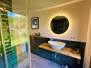 Shower, hair dryer, towels, soap