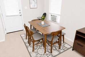 Dining area with seating for shared meals and game nights
