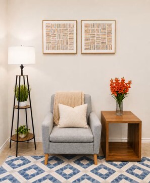 Cozy armchair corner with floor lamp in the living room