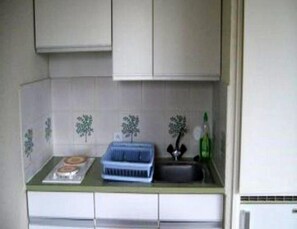 Fridge, microwave, cookware/dishes/utensils