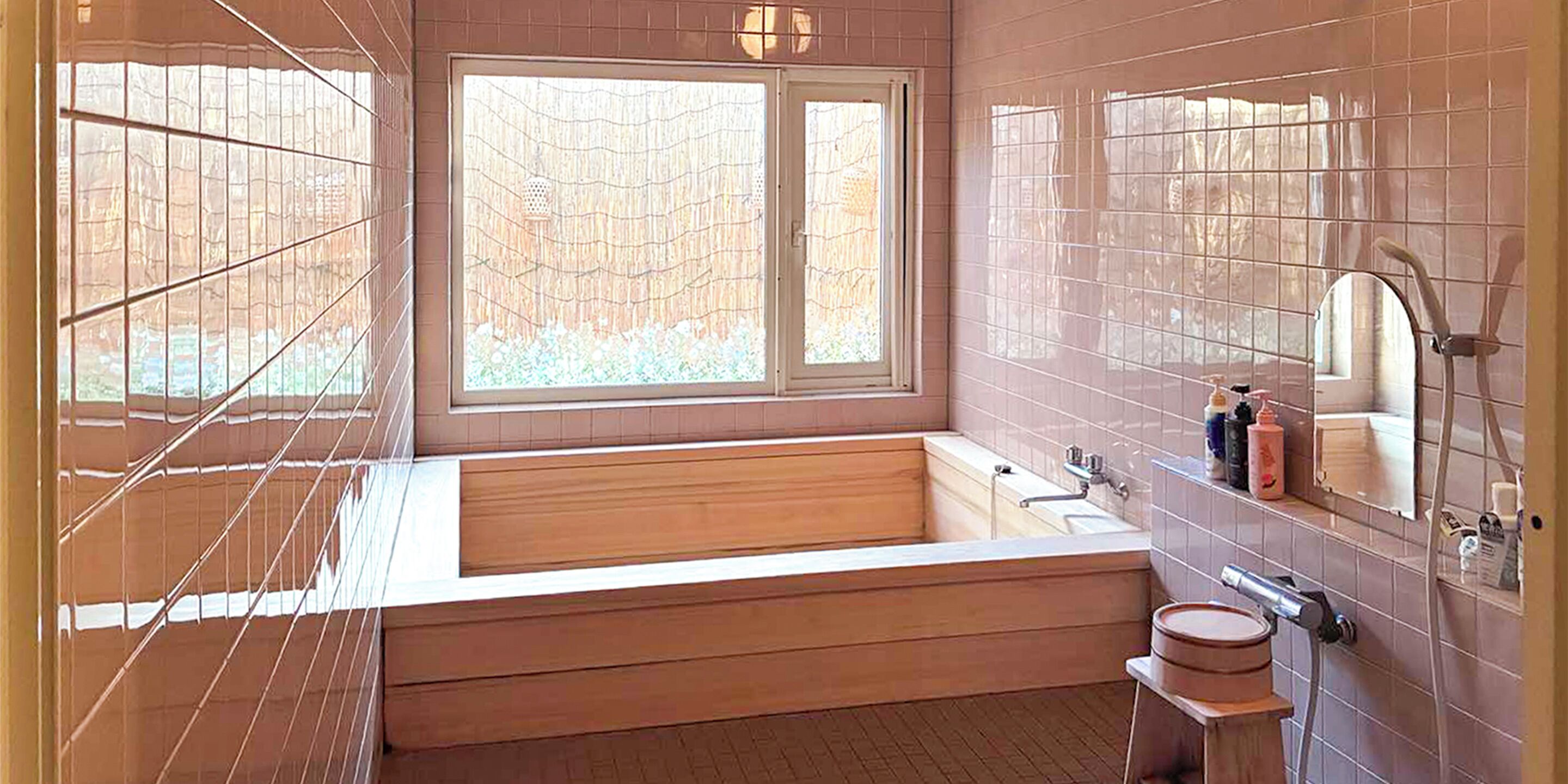 Separate bathtub and shower, hair dryer, slippers, towels
