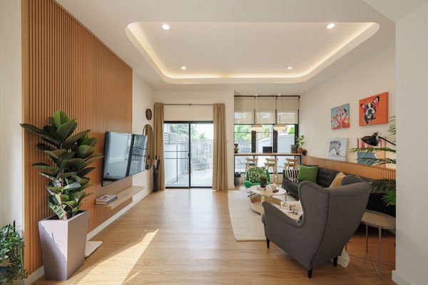 Cozy & spacious living room with smart 65" HD TV