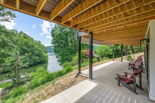 Lakefront home on Claytor Lake with private dock, scenic decks, stylish interiors, and cozy bedrooms