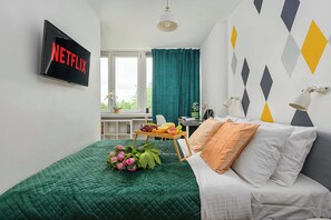 1 slaapkamer, een bureau, een strijkplank/strijkijzer, wifi