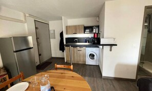 Fridge, microwave, cookware/dishes/utensils