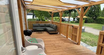Luxury chalet on 5-star campsite with spacious veranda