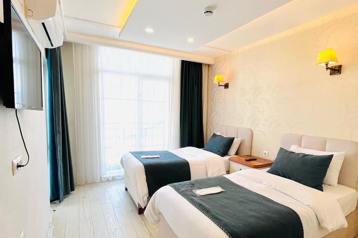 Deluxe suite, balkon, uitzicht op stad | Geluiddichte muren, gratis wifi
