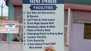 A signboard for a 5-star dormitory listing amenities such as AC/Non AC dormitory, 24/7 hot & cold water, free high-speed wifi, reading lights, wall fans, charging points, locker facility, CCTV security, and proximity to ISBT bus stand. - 5 Star Dormitory  (Jabalpur)