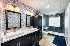 Shower, hair dryer, towels, soap